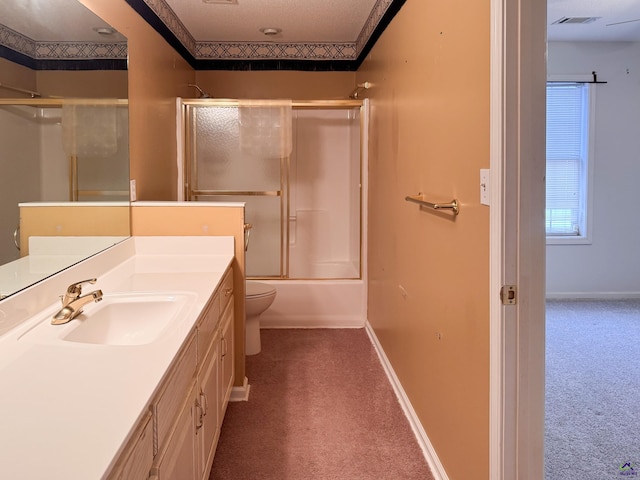 full bathroom featuring shower / bath combination with glass door, vanity, and toilet