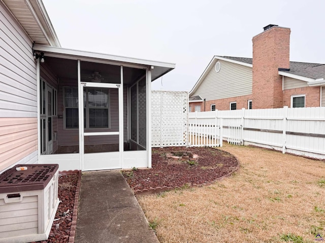 view of yard with a sunroom