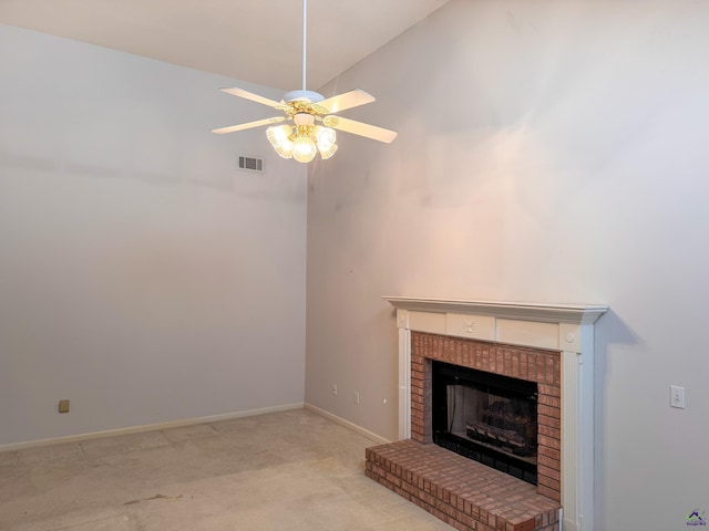 unfurnished living room with a fireplace, light carpet, vaulted ceiling, and ceiling fan