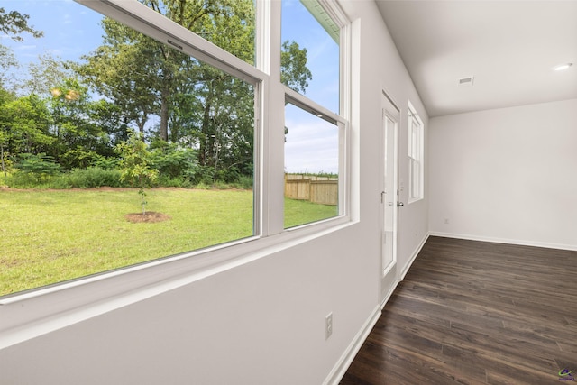 unfurnished sunroom featuring plenty of natural light