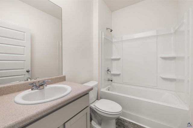 full bathroom featuring shower / tub combination, vanity, and toilet