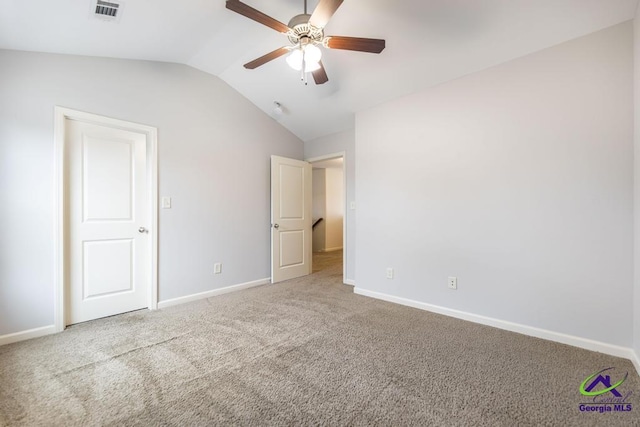 unfurnished bedroom featuring carpet floors, ceiling fan, and lofted ceiling