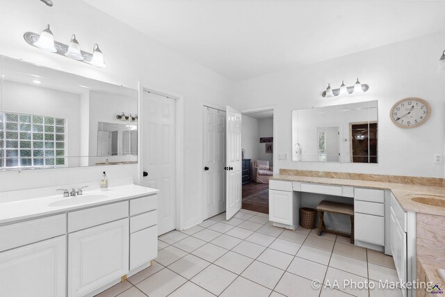 bathroom featuring tile patterned floors and vanity