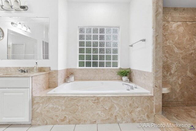 bathroom featuring vanity, separate shower and tub, and tile patterned floors