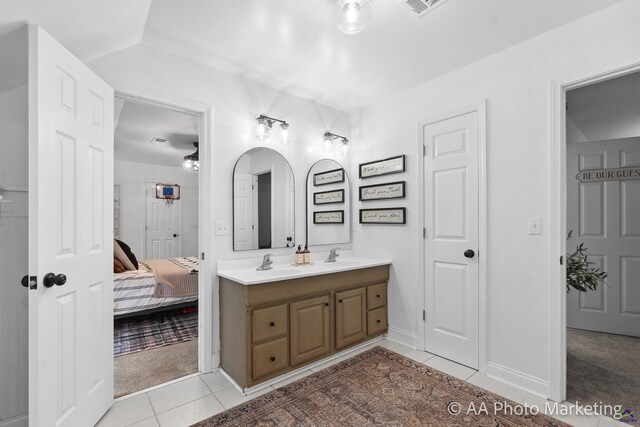 bathroom featuring vanity and tile patterned floors