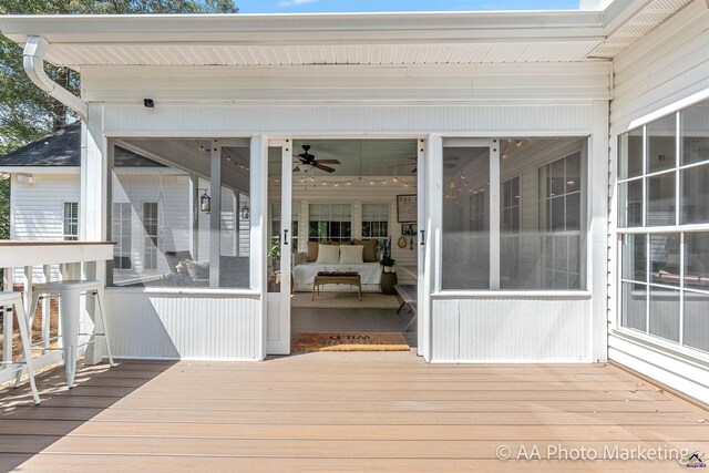 wooden terrace with a sunroom