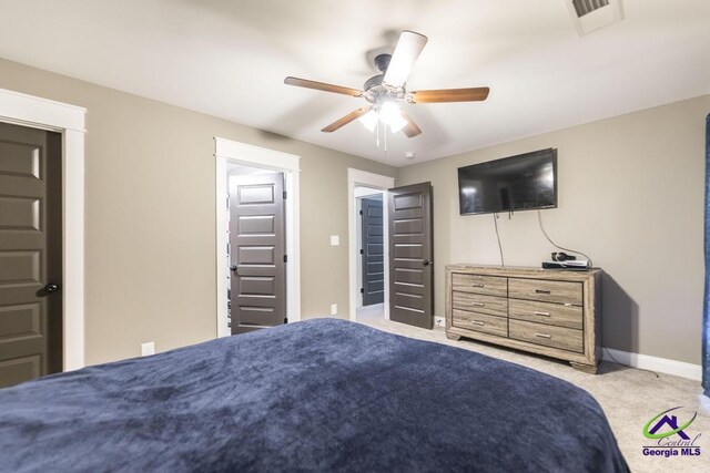 carpeted bedroom featuring ceiling fan