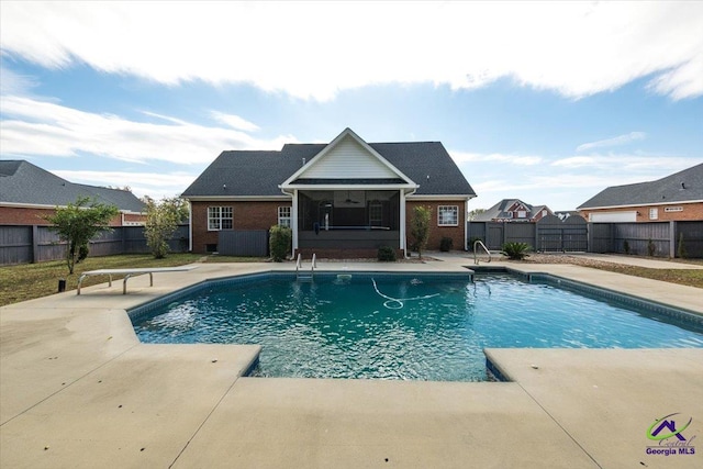 view of pool featuring a sunroom