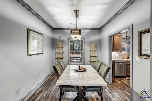 dining room with crown molding and dark wood-type flooring