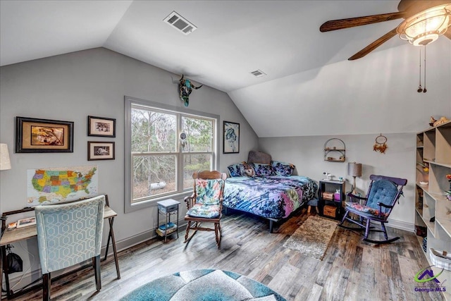 bedroom with hardwood / wood-style floors, ceiling fan, and lofted ceiling