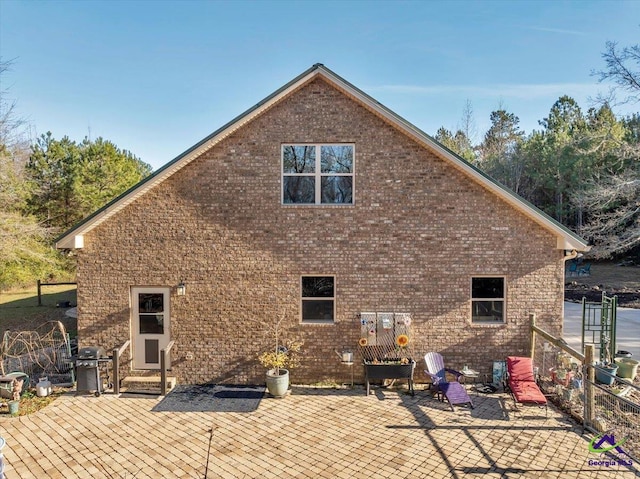 rear view of property with a patio