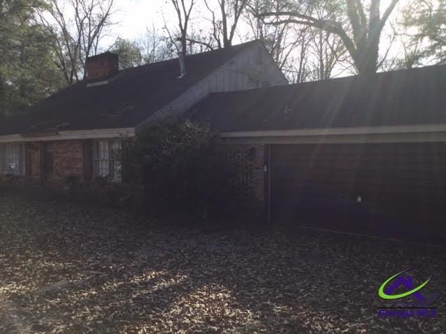 exterior space with a garage