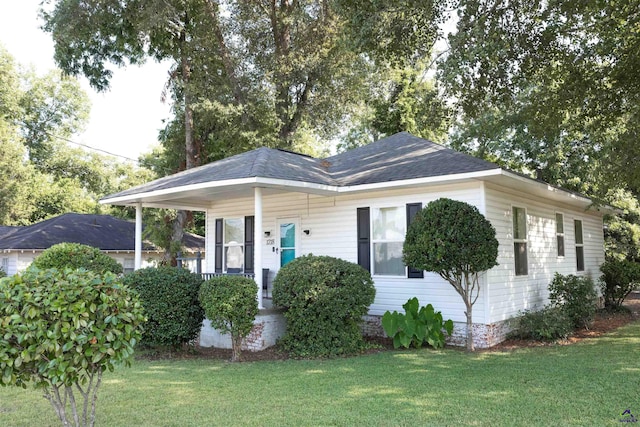 ranch-style house with a front lawn