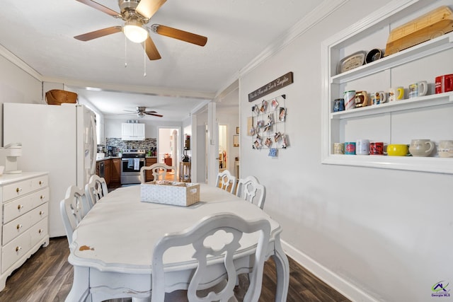 dining space with dark hardwood / wood-style floors, ceiling fan, and crown molding