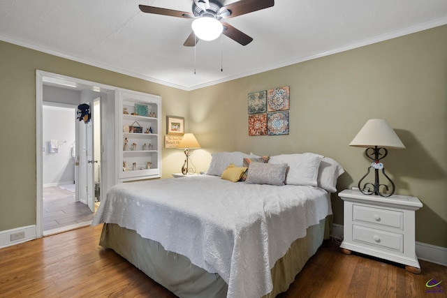 bedroom with ceiling fan, hardwood / wood-style floors, and crown molding