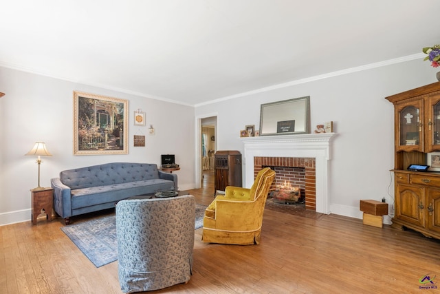 living room featuring a fireplace, hardwood / wood-style flooring, and ornamental molding