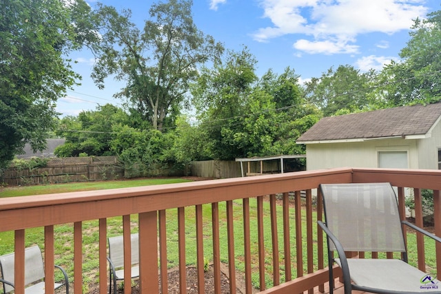 wooden deck with a yard