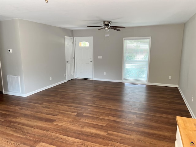 interior space featuring dark hardwood / wood-style floors and ceiling fan