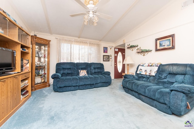 living room featuring carpet flooring, ceiling fan, crown molding, and vaulted ceiling