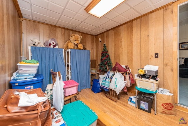 interior space featuring wood walls and hardwood / wood-style floors