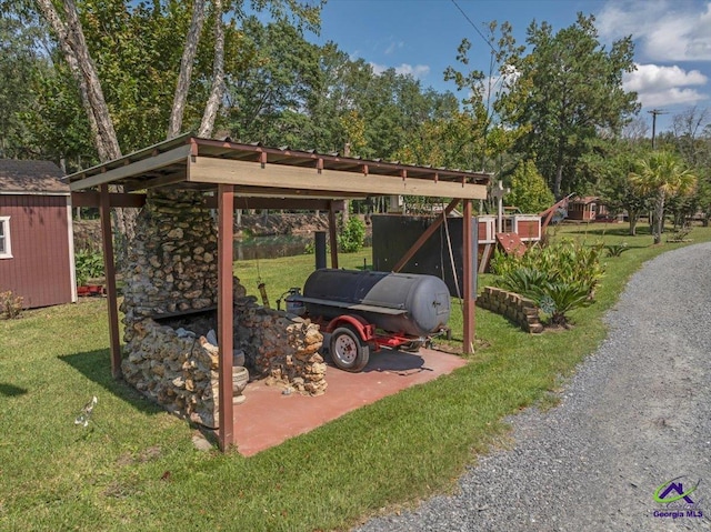 exterior space with a shed and a carport