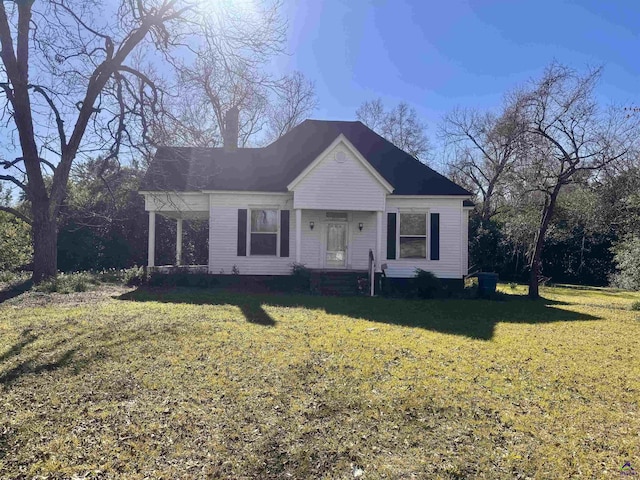 view of front of home with a front lawn