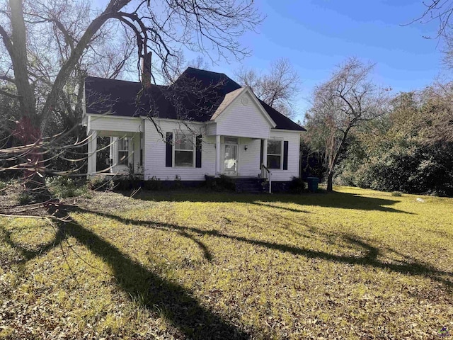 view of front of house with a front yard