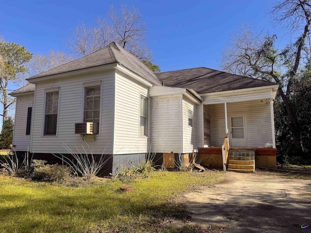 view of front of house with cooling unit