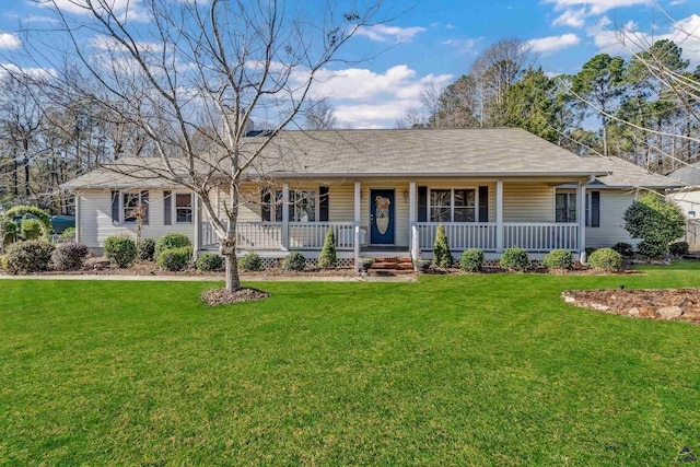 ranch-style house featuring a front lawn and a porch