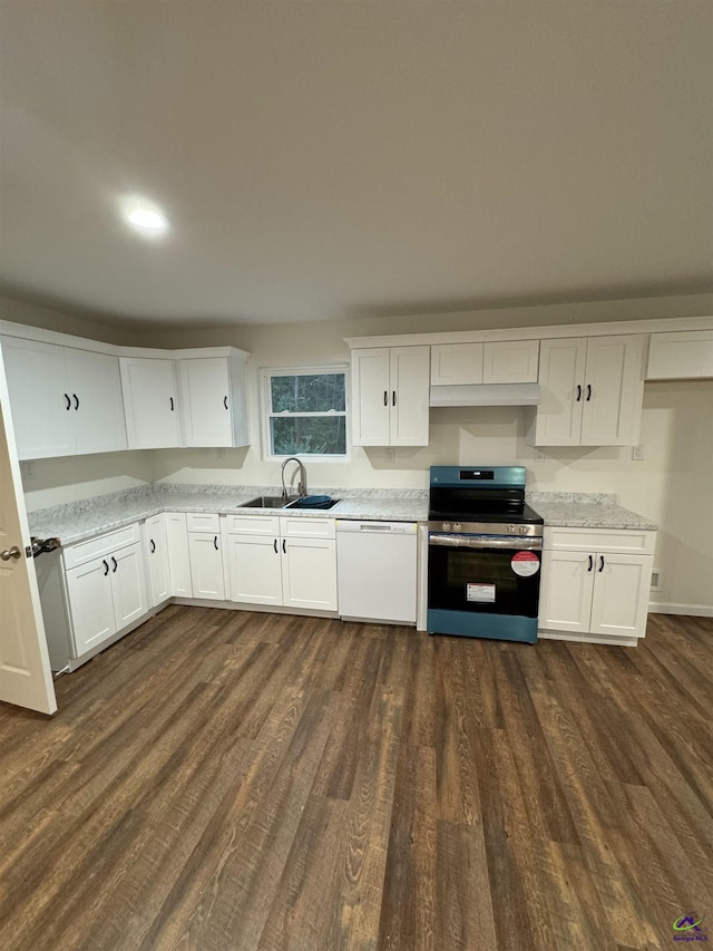 kitchen with light stone countertops, dishwasher, sink, stainless steel range oven, and white cabinets