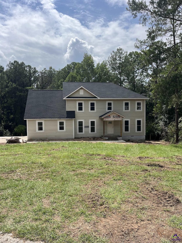 view of front facade with a front lawn