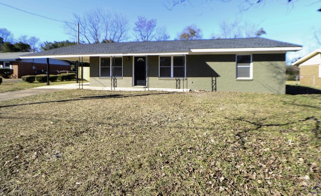 ranch-style house featuring a carport