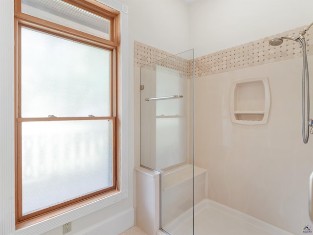 bathroom with an enclosed shower