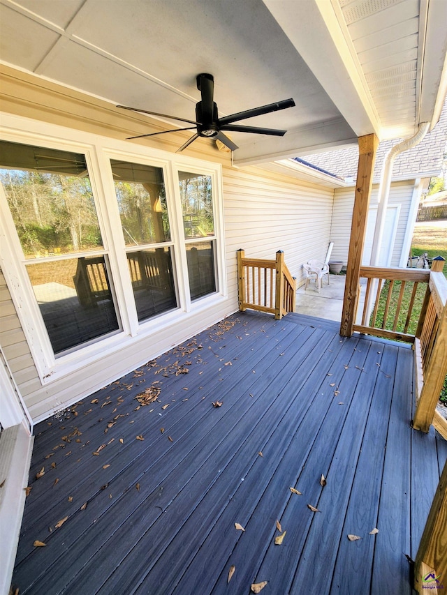 wooden deck with ceiling fan