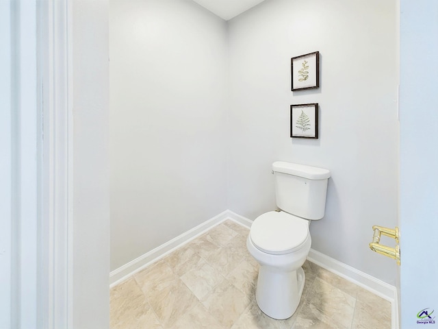 bathroom featuring toilet