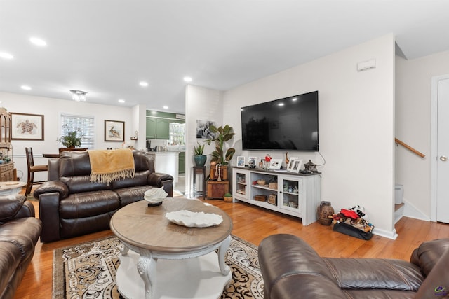 living room with light hardwood / wood-style flooring