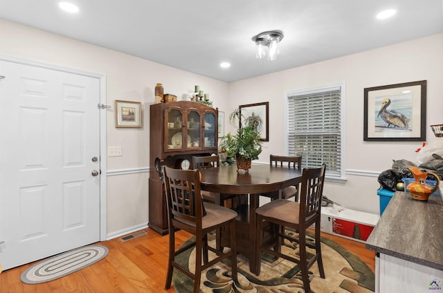 dining room featuring light hardwood / wood-style flooring