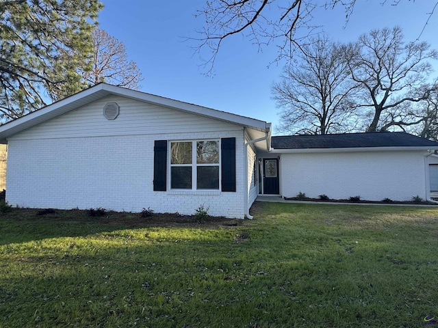 exterior space with a front yard