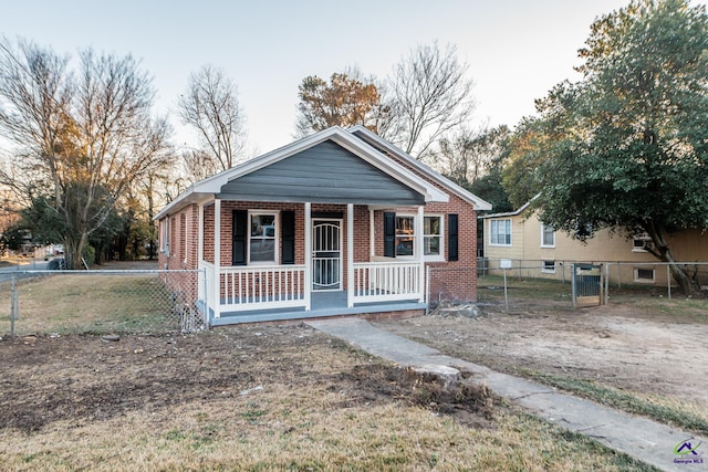 bungalow-style house with covered porch