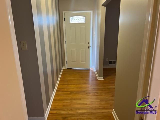 doorway to outside featuring light hardwood / wood-style flooring