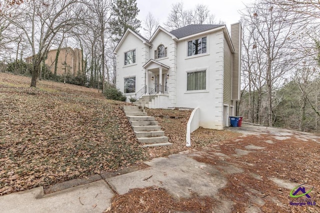 front of property featuring a garage