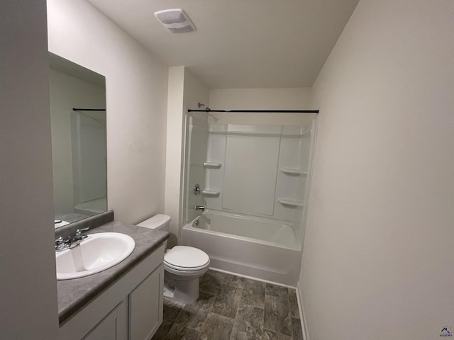 full bathroom featuring shower / bathing tub combination, vanity, and toilet