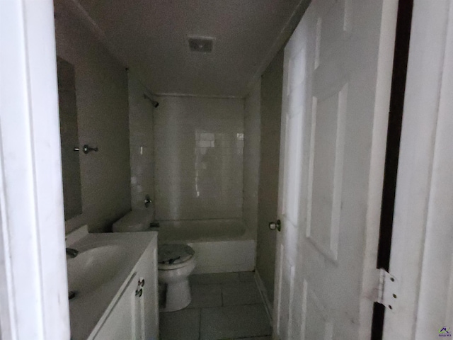 full bathroom featuring tile patterned flooring, vanity, toilet, and washtub / shower combination