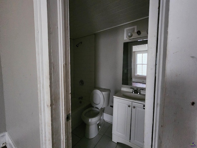 full bathroom with bathing tub / shower combination, tile patterned flooring, vanity, and toilet