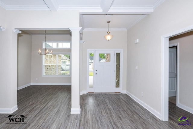 foyer with an inviting chandelier, crown molding, beamed ceiling, and dark wood-type flooring