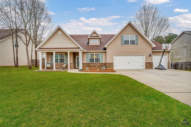 view of front of house with a porch, a front yard, and a garage