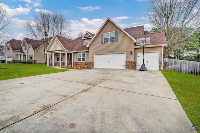 front of property with a garage and a front yard