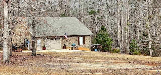 exterior space featuring a garage