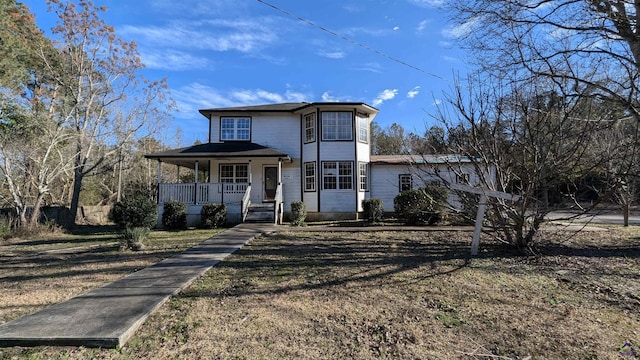 view of property with covered porch