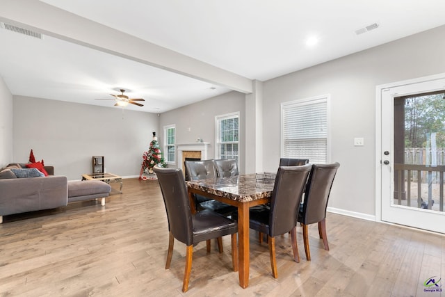 dining room featuring ceiling fan and light wood-type flooring